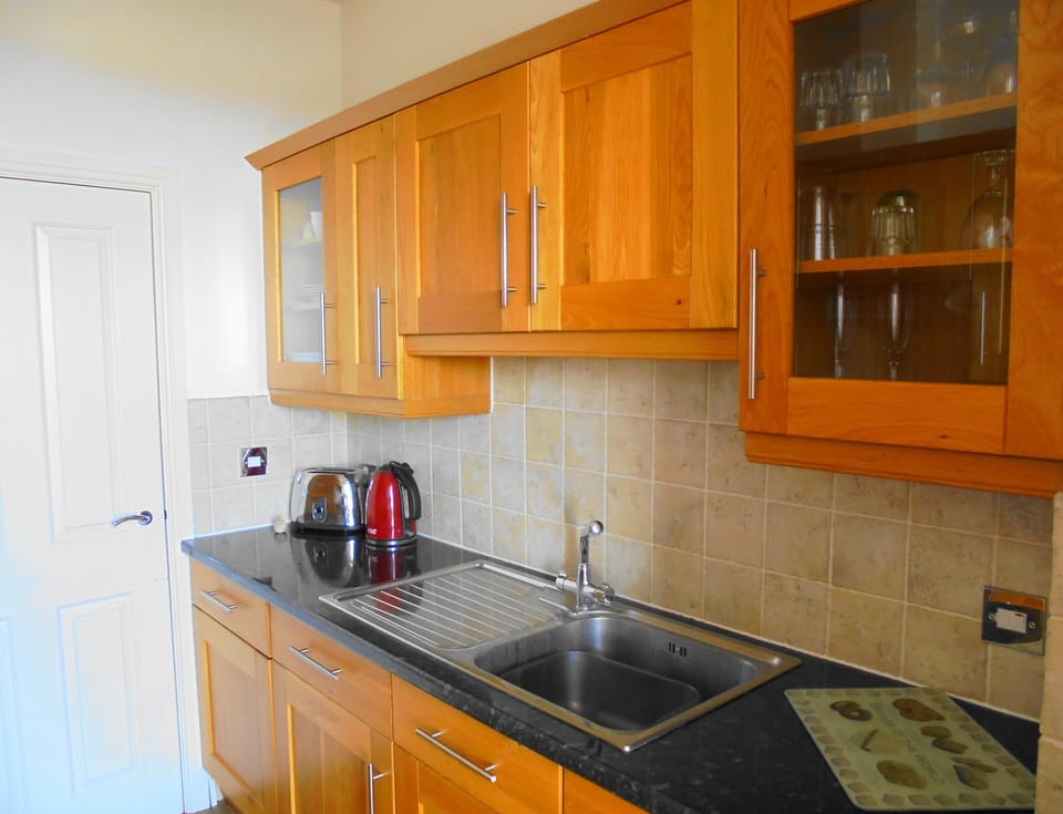 Kitchen with door to balcony