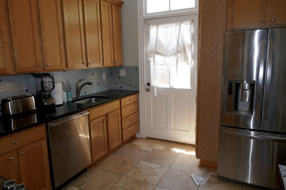 Kitchen.  All stainless. Electric range, french door fridge freezer. 
