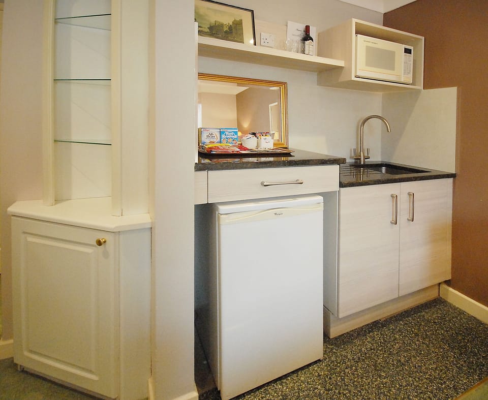 Fridge, microwave, coffee/tea maker, electric kettle