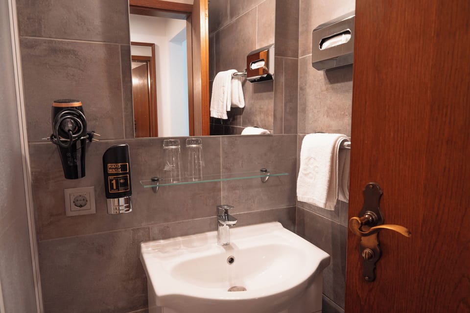 Shower, free toiletries, towels, soap