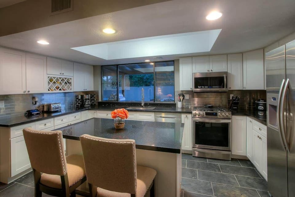 The kitchen island is perfect for entertaining while preparing meals for friends and family.