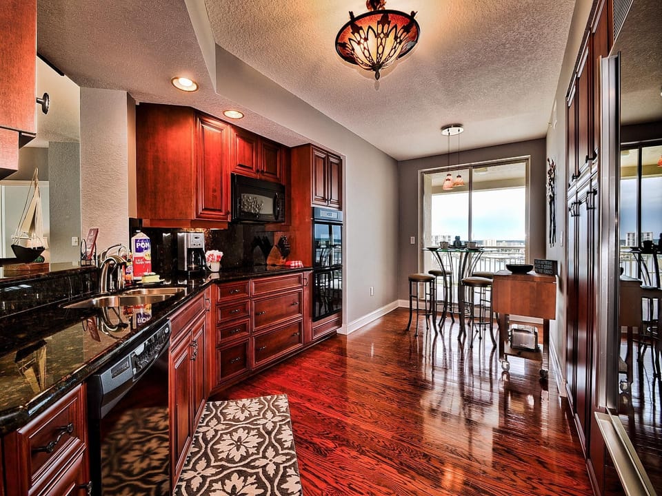 Large kitchen with balcony access.