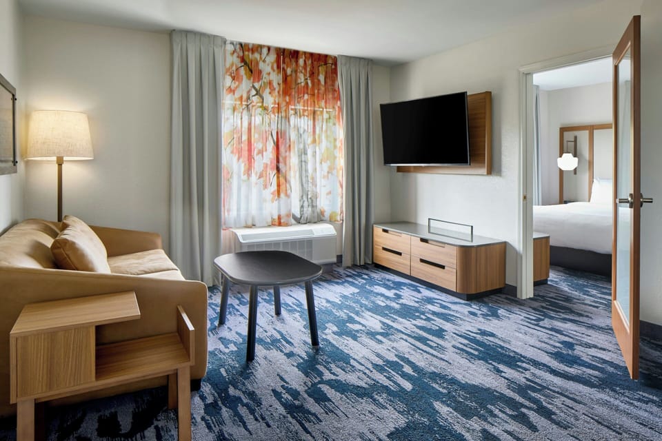 Executive Suite, 1 King Bed with Sofa bed | Living room | 50-inch LED TV with cable channels, Netflix, streaming services