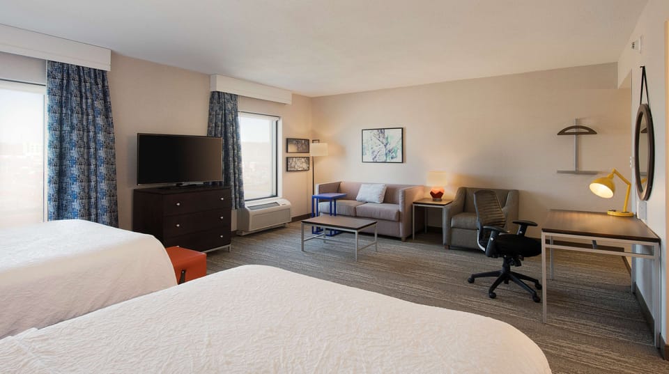Studio Suite (2 Queen Beds with Sofa bed) | Living area | 55-inch LCD TV with digital channels, TV