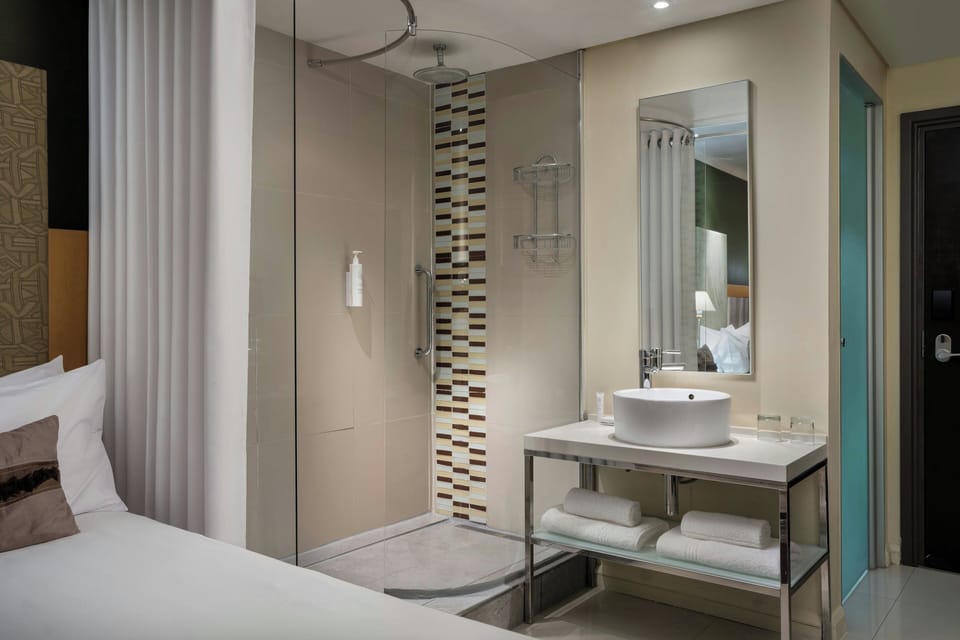 Shower, free toiletries, hair dryer, towels