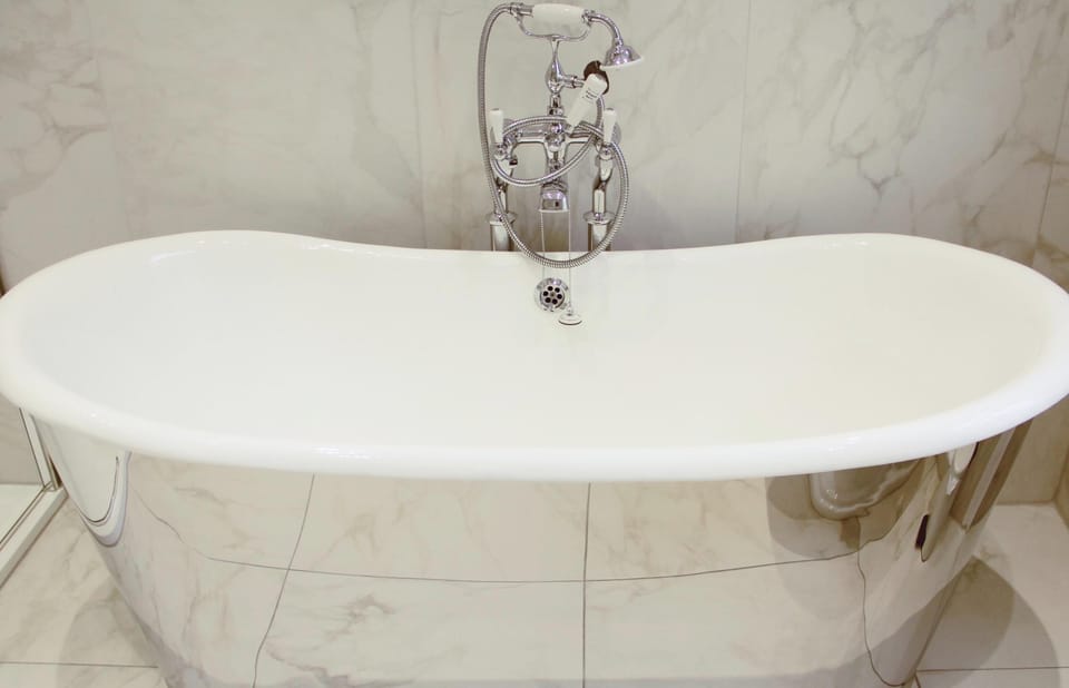 Soak away in this luxurious steel bathtub.