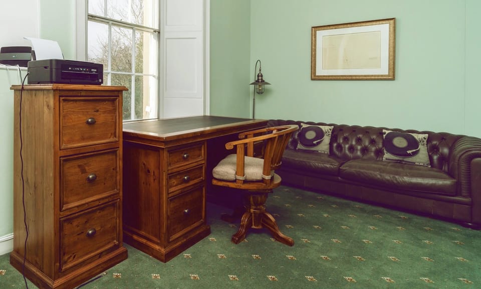 Office with a printer, for catching up on work away from it all.