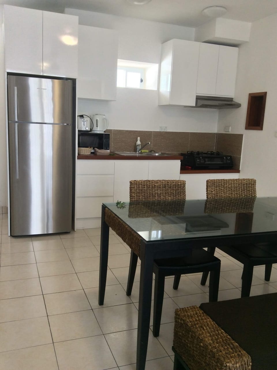 1 Bedroom Hibiscus Apartment | Private kitchen | Fridge, coffee/tea maker