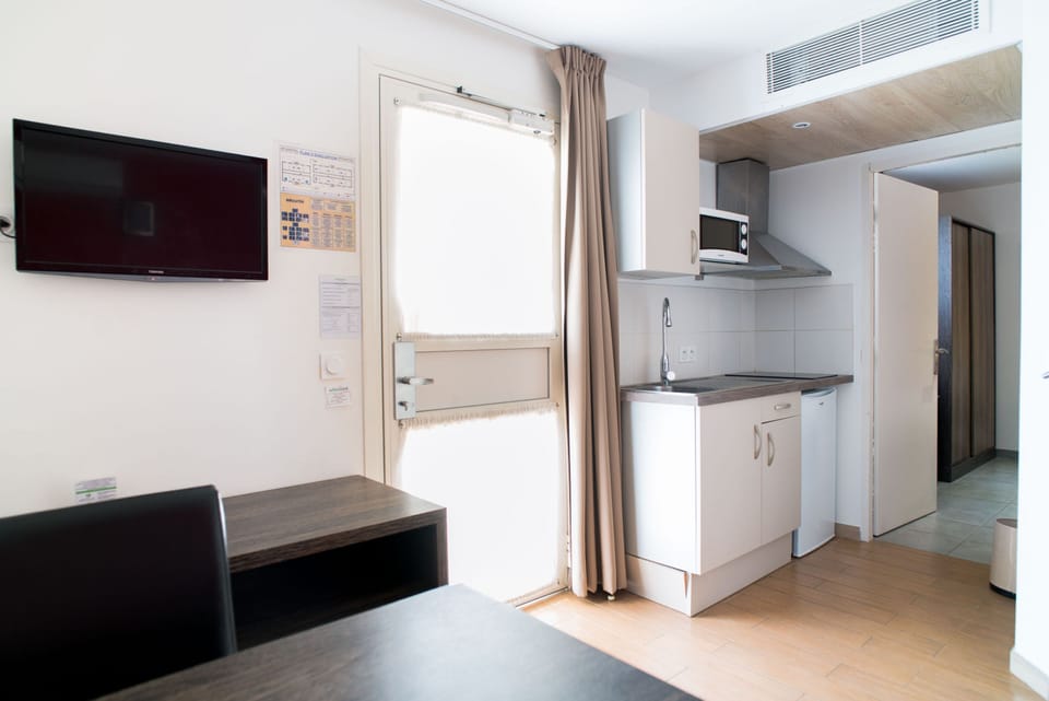 Standard Apartment | Private kitchen | Shared fridge, microwave