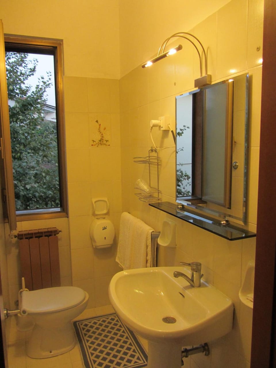 Shower, rainfall showerhead, hair dryer, towels