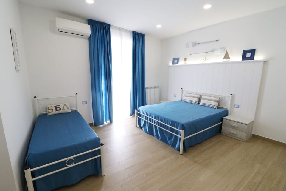 Quadruple Room, Balcony (Anacapri) | Minibar, in-room safe, desk, soundproofing