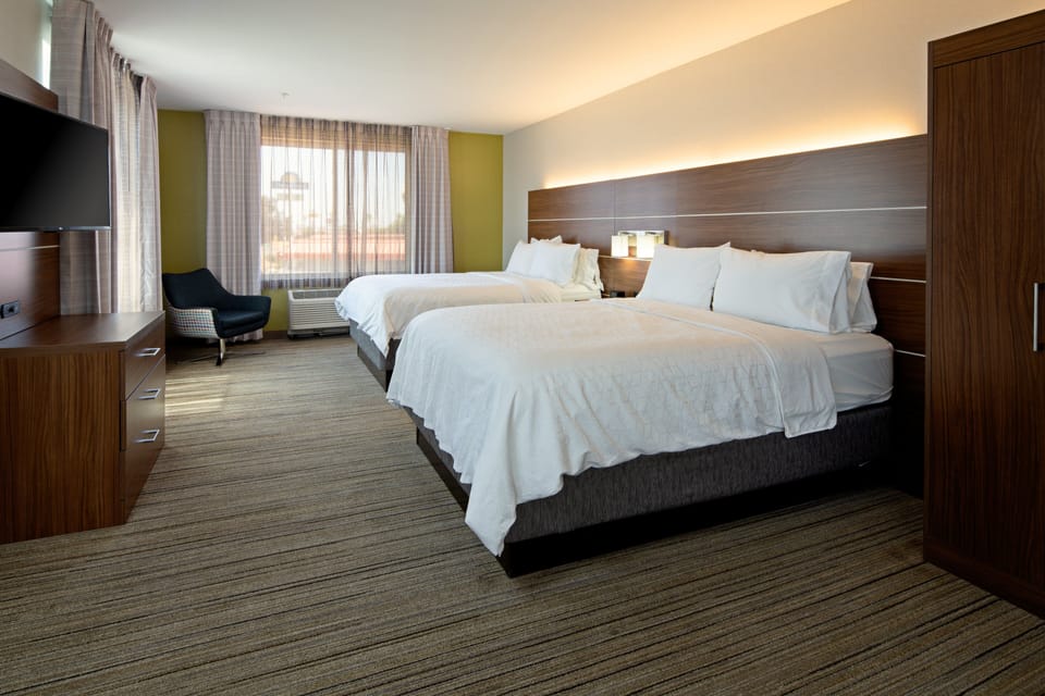 Suite, 2 Queen Beds (Extra Floor Space) | Pillowtop beds, in-room safe, desk, iron/ironing board