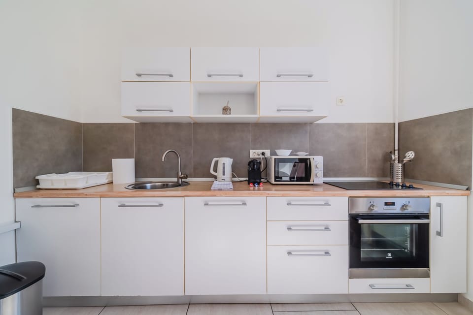 Apartment | Private kitchen | Fridge, microwave, coffee/tea maker