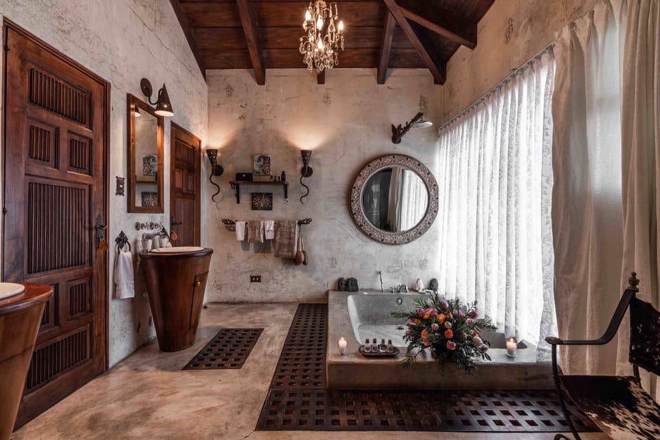Signature Suite | Bathroom | Free toiletries, hair dryer, bathrobes, towels