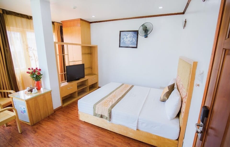 Single Room, City View | Minibar, desk, free WiFi