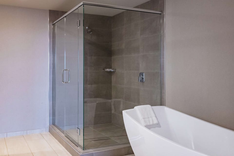 Suite, 1 Bedroom | Bathroom | Free toiletries, hair dryer, towels, soap