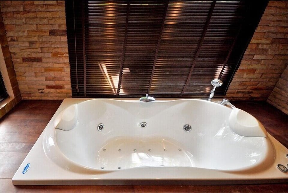one of 2 jacuzzi baths