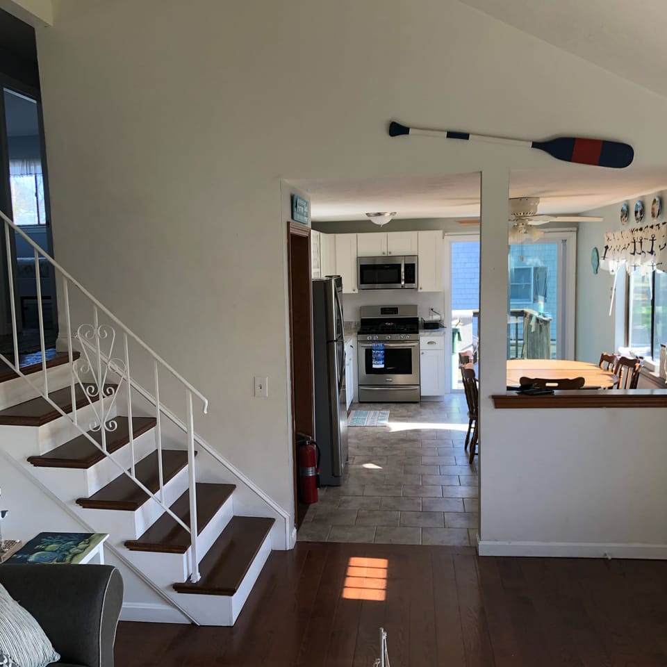 Stairs lead up to 3 bedrooms and a full bathroom.  