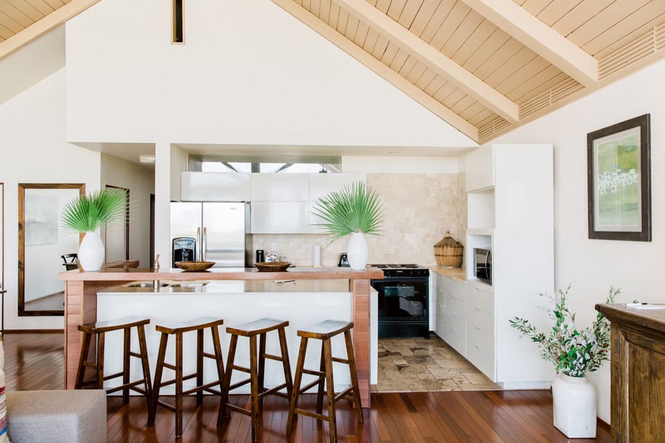 Luxury Suite, Multiple Beds | Private kitchen | Fridge, microwave
