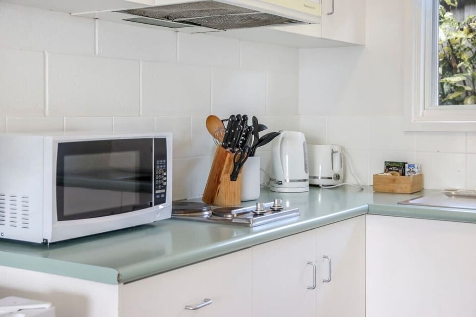 Fully equipped kitchenette with kettle, toaster and everyday cooking essentials.