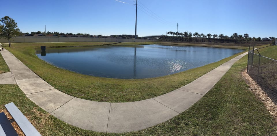 Nice walking path and fishing pond just a block from the house!