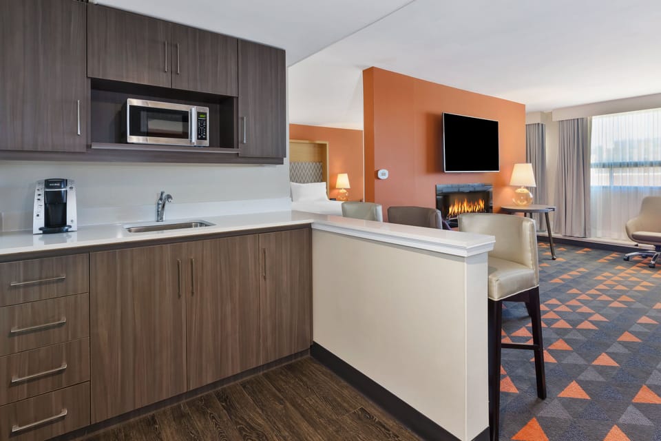 Suite, 1 King Bed with Sofa bed | In-room safe, desk, iron/ironing board, free cribs/infant beds