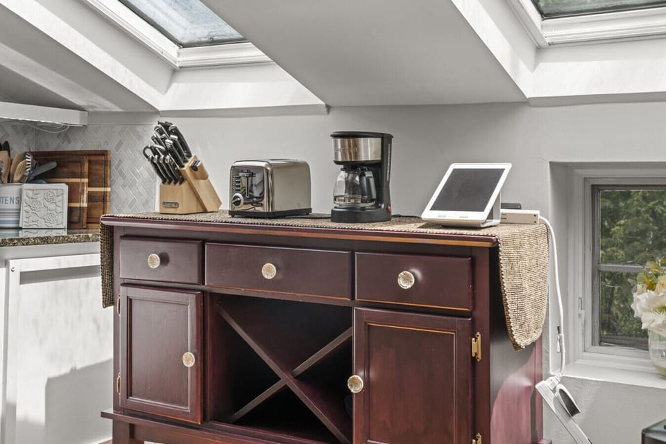 coffee maker, toaster, and cutlery.
