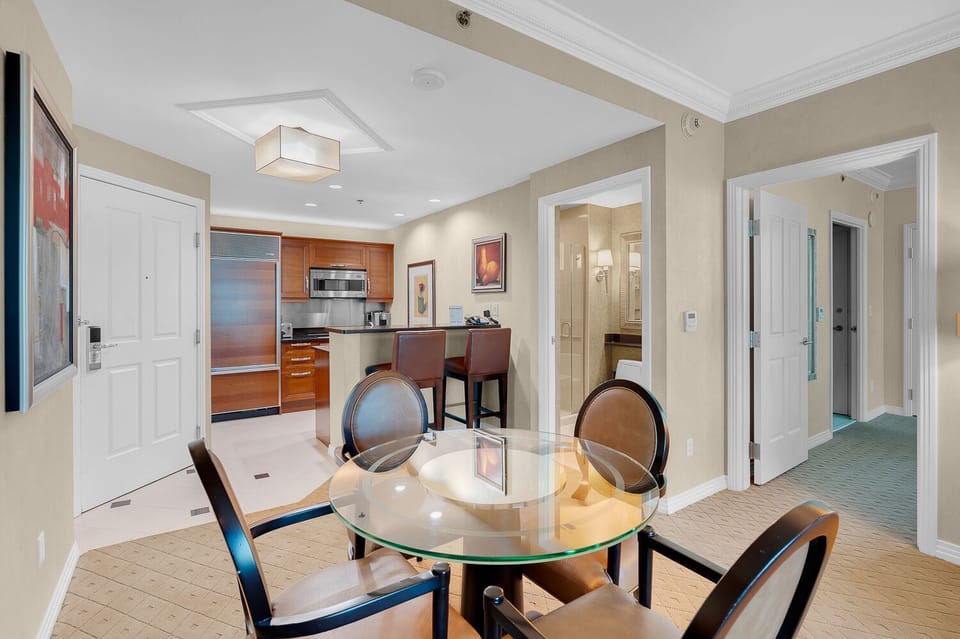 Dining table and kitchen.