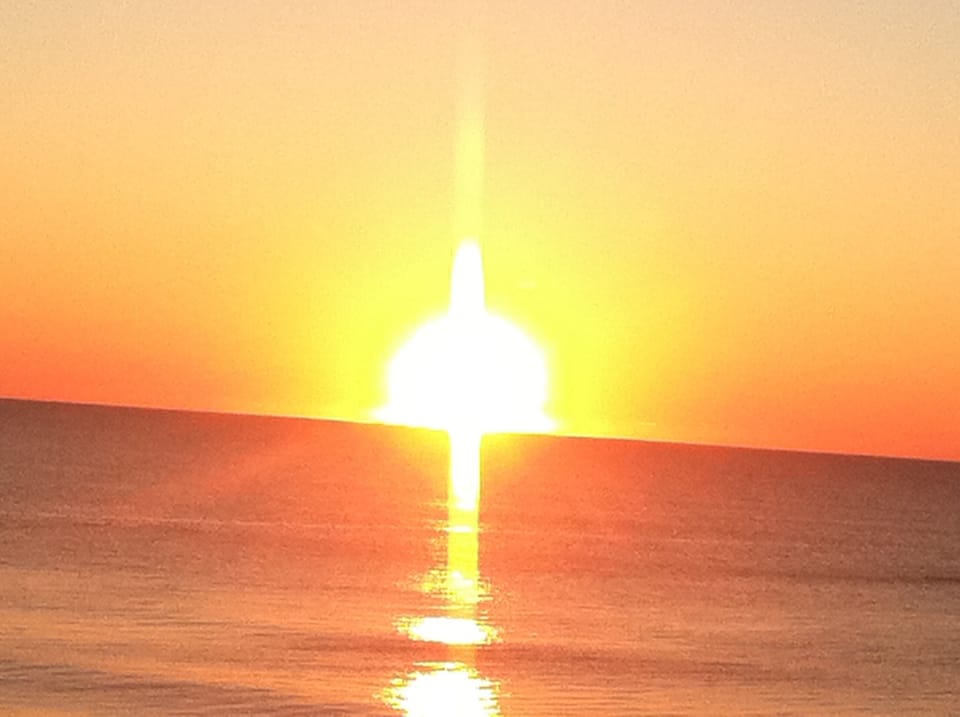 Now this is a sun rise! View from condo balcony