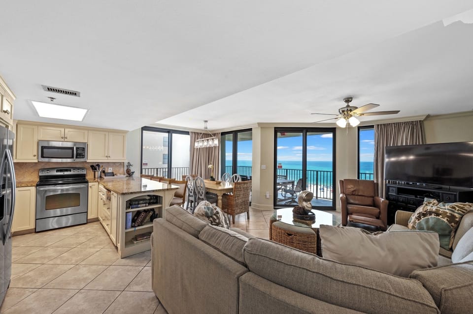 Spacious Living and Dining Areas with Balcony Access