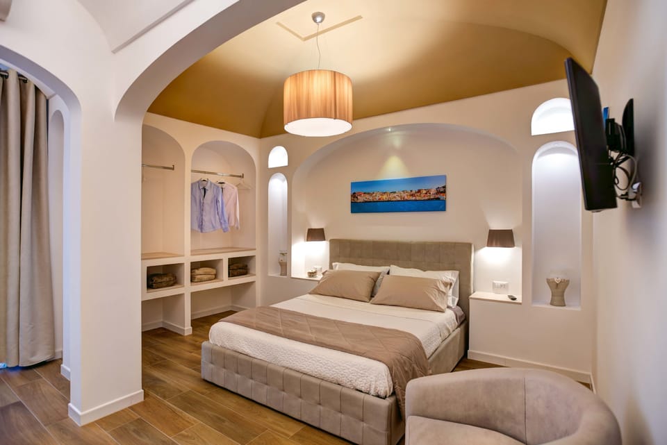 Family Room, 2 Bedrooms, Kitchenette | Minibar, in-room safe, desk, WiFi (free)
