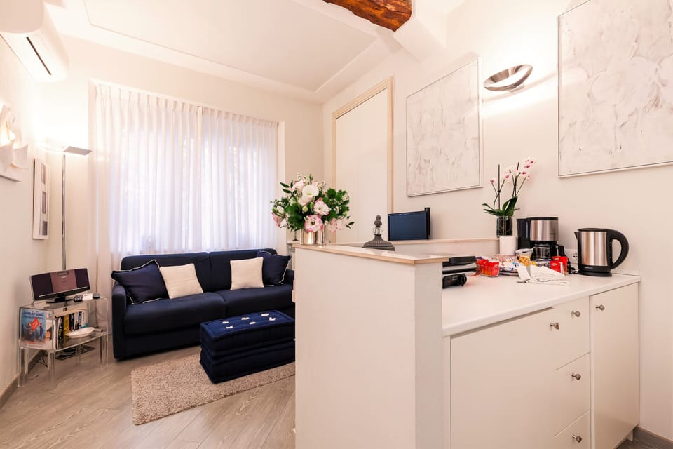 The living room with a comfortable double sofa bed, Ac, tv and stereo