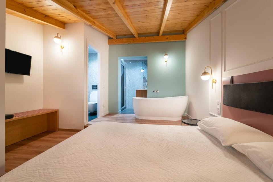 Suite | Premium bedding, in-room safe, desk, soundproofing