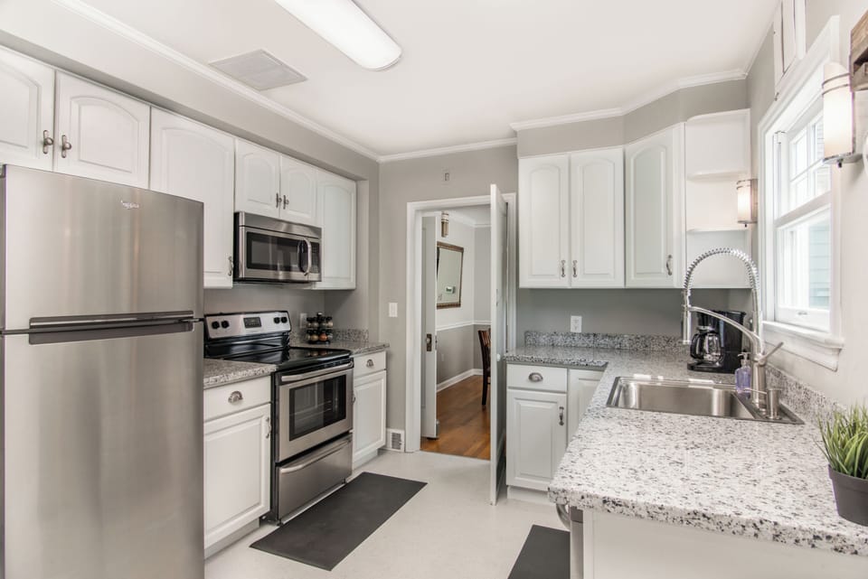 Kitchen Located off the Dining Room | Full Size Fridge w/ Freezer | Ice in Freezer | Built-in Microwave | Locally Roasted Coffee "Table Top Coffee Roasters" Creamer & Sugar Provided