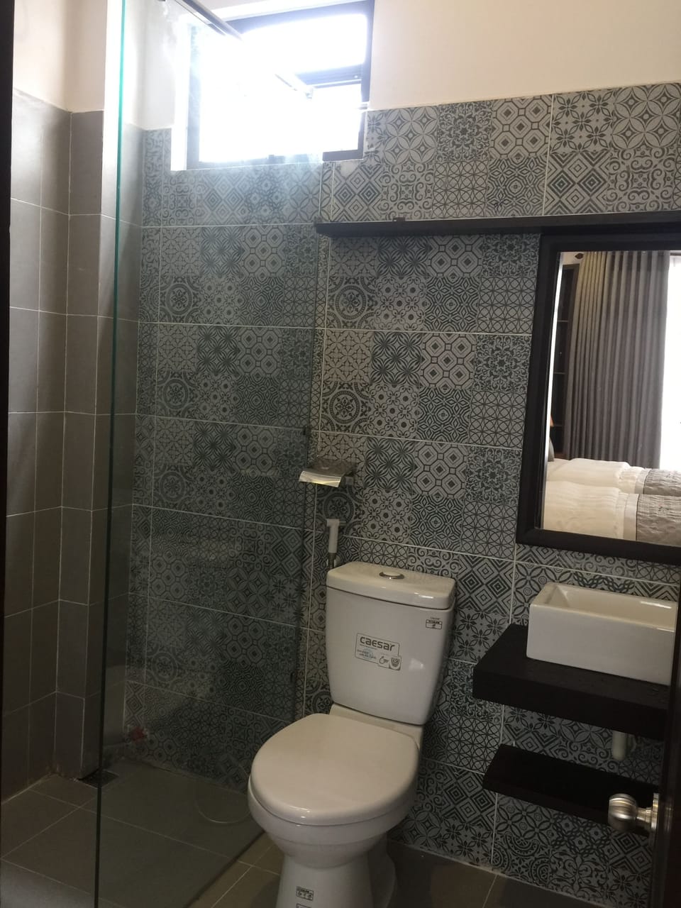 Shower, designer toiletries, hair dryer, slippers