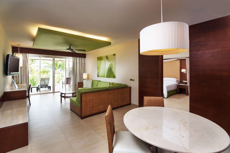 Suite, Sea View (Premium Level Room) | Premium bedding, minibar, in-room safe, individually decorated