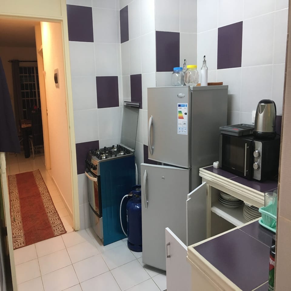 Comfort Apartment, 1 Bedroom, Non Smoking | Private kitchen | Coffee/tea maker, full-size fridge, microwave, oven