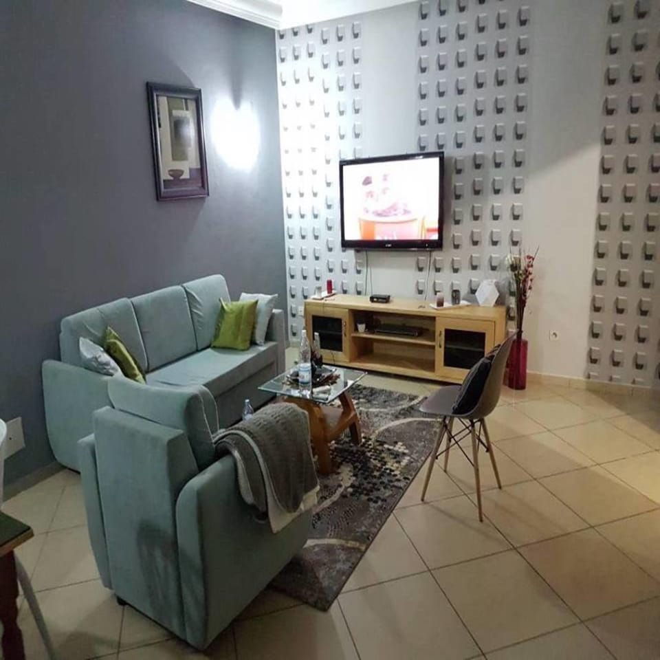 Comfort Apartment | Living area | Flat-screen TV