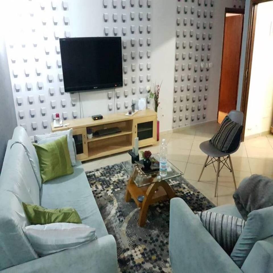 Comfort Apartment | Living area | Flat-screen TV