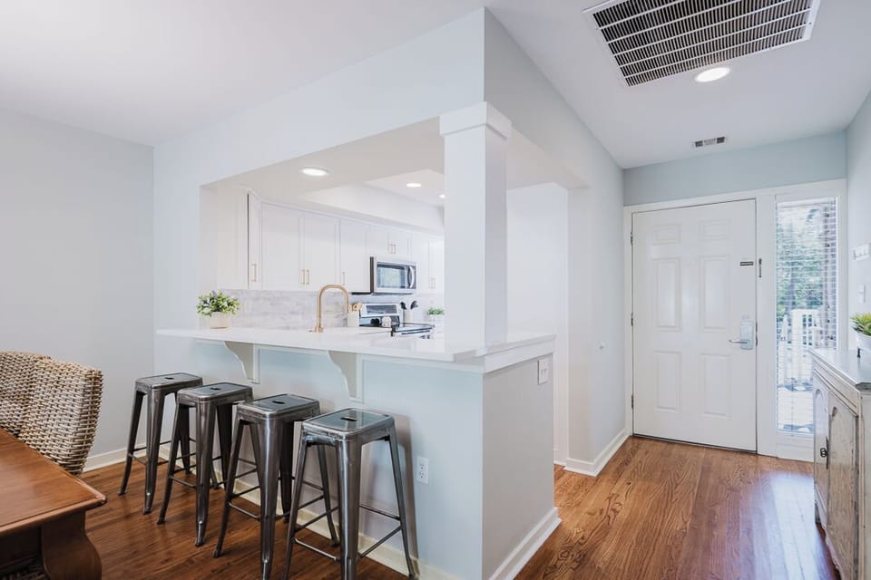 The kitchen has been opened up to the main living area.
