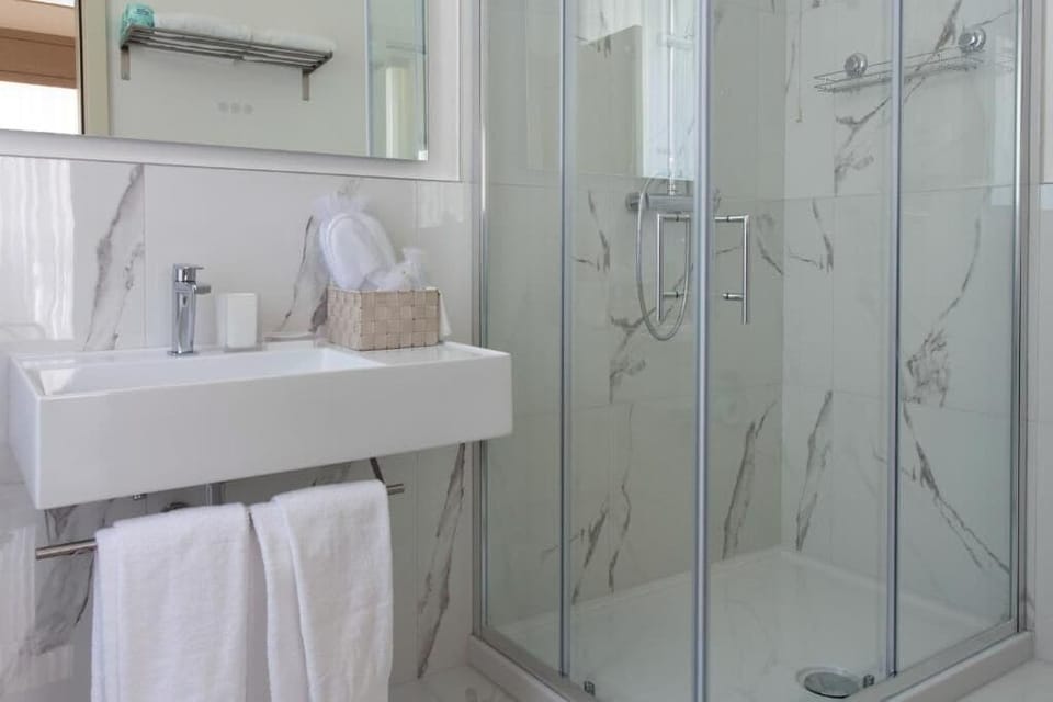 Double or Twin Room (Ground Floor) | Bathroom | Shower, hair dryer, bathrobes, slippers