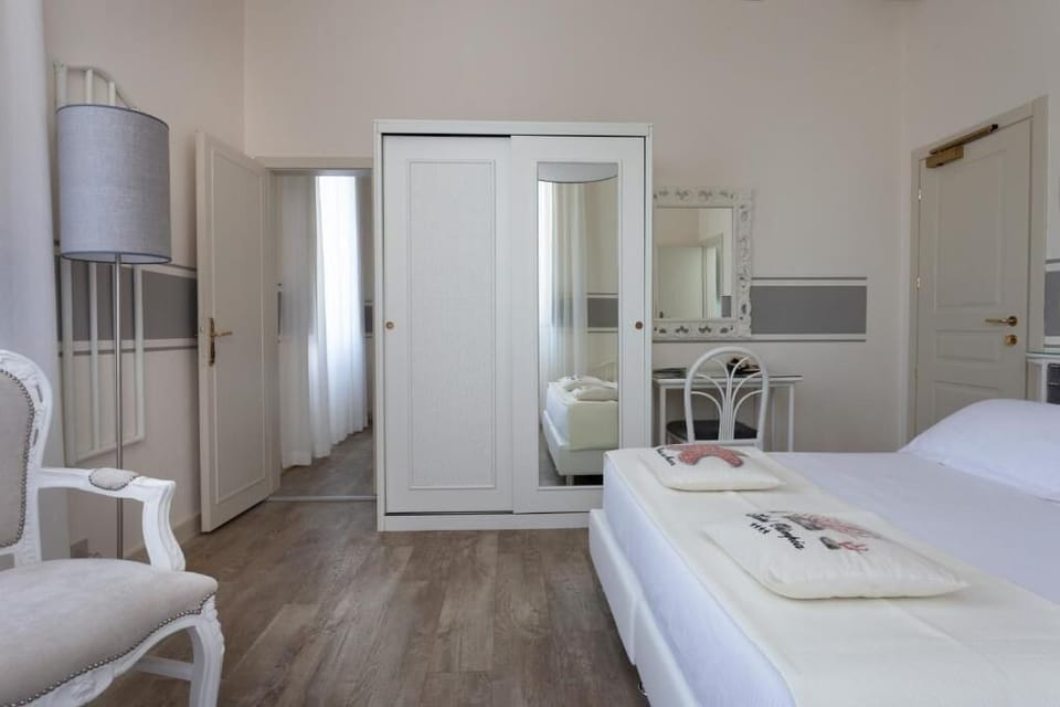 Suite (Connecting Double Room) | Minibar, in-room safe, iron/ironing board, cribs/infant beds