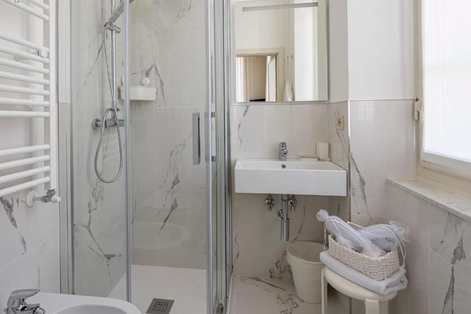 Suite (Connecting Double Room) | Bathroom | Shower, hair dryer, bathrobes, slippers