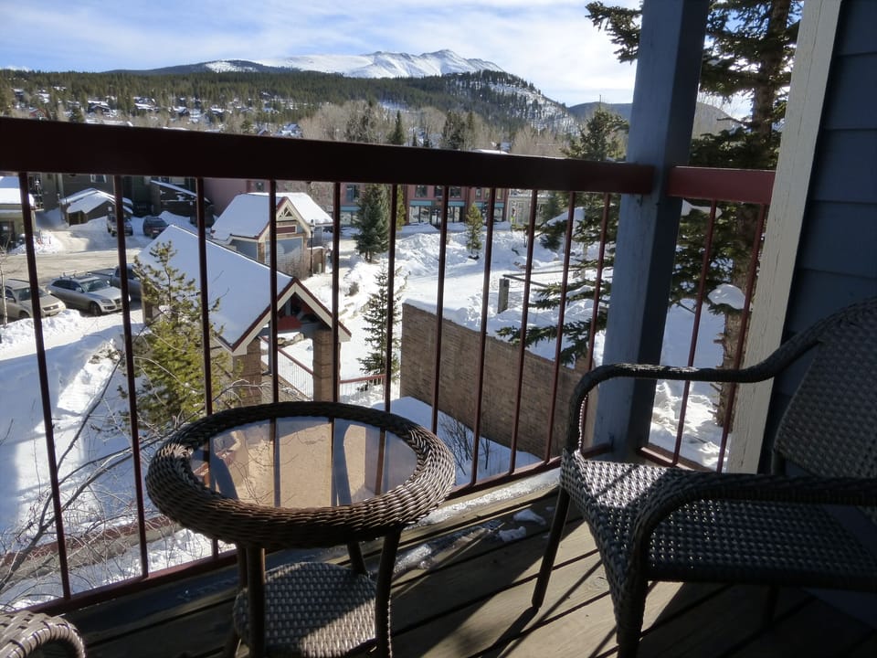 Deck with table & chairs overlooking the Blue River