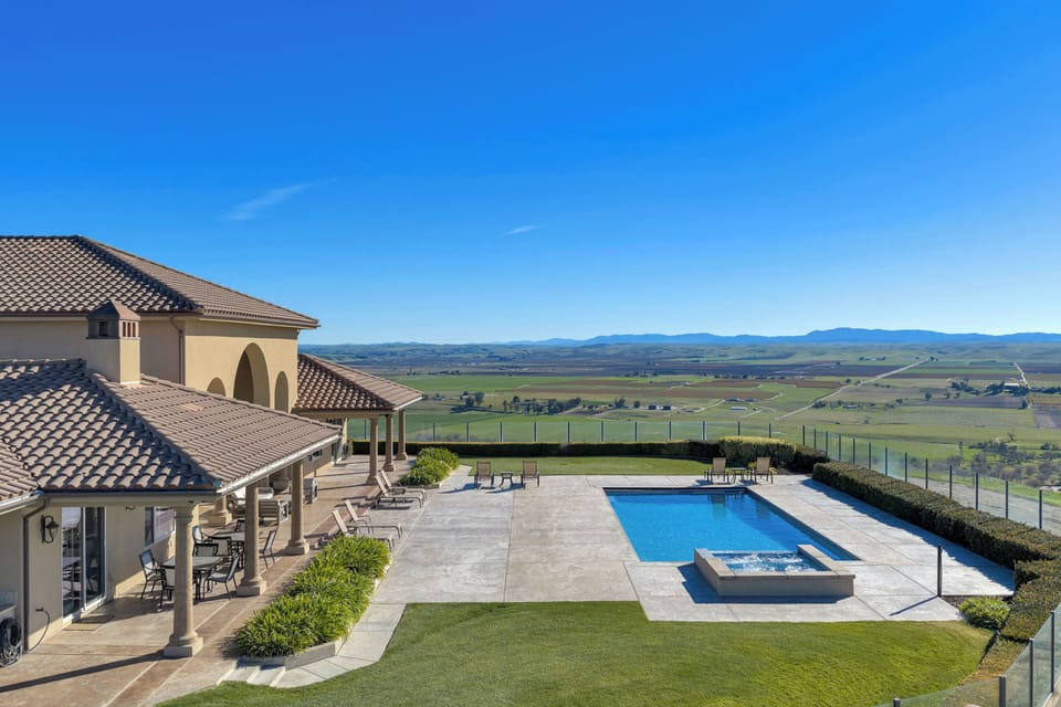 Unwind by the pool while taking in the expansive valley views