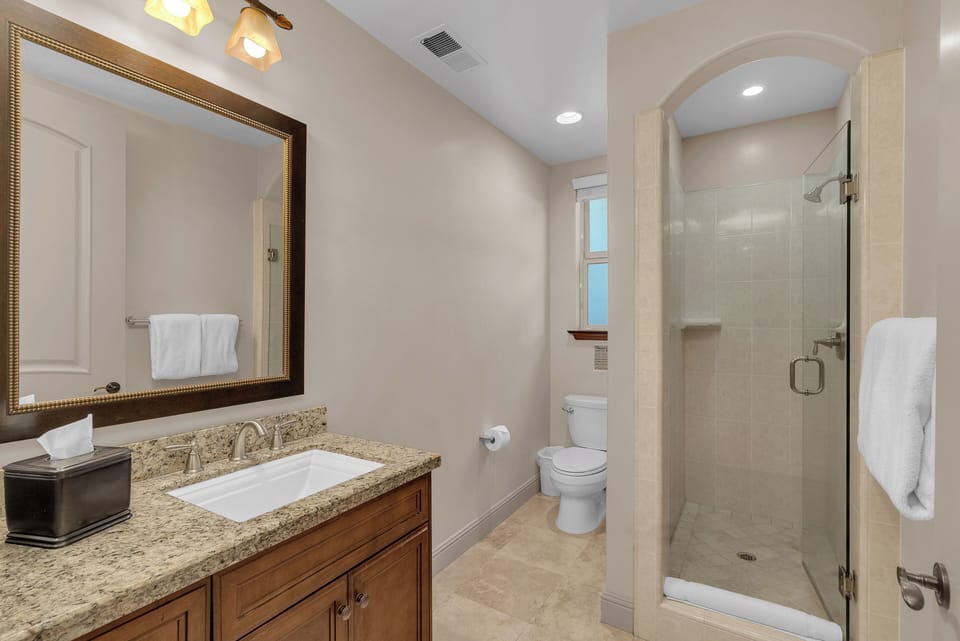 Refresh in the walk-in shower with glass enclosure