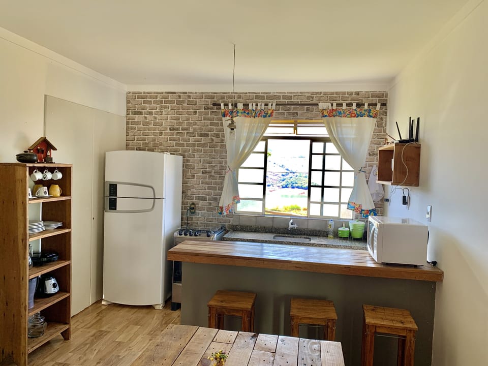 Basic Cottage | Private kitchen | Full-size fridge, microwave, cookware/dishes/utensils