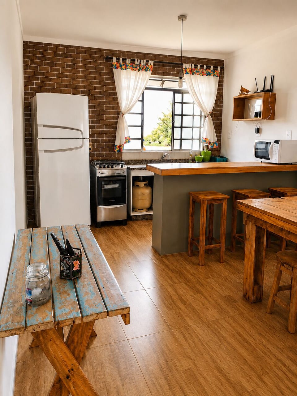 Full-size fridge, microwave, cookware/dishes/utensils