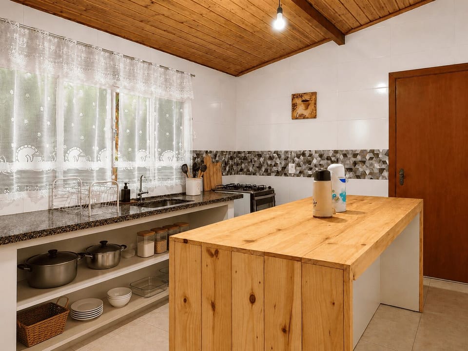 Full-size fridge, oven, stovetop, cookware/dishes/utensils