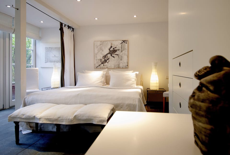 Grand Suite | Premium bedding, down comforters, soundproofing, rollaway beds